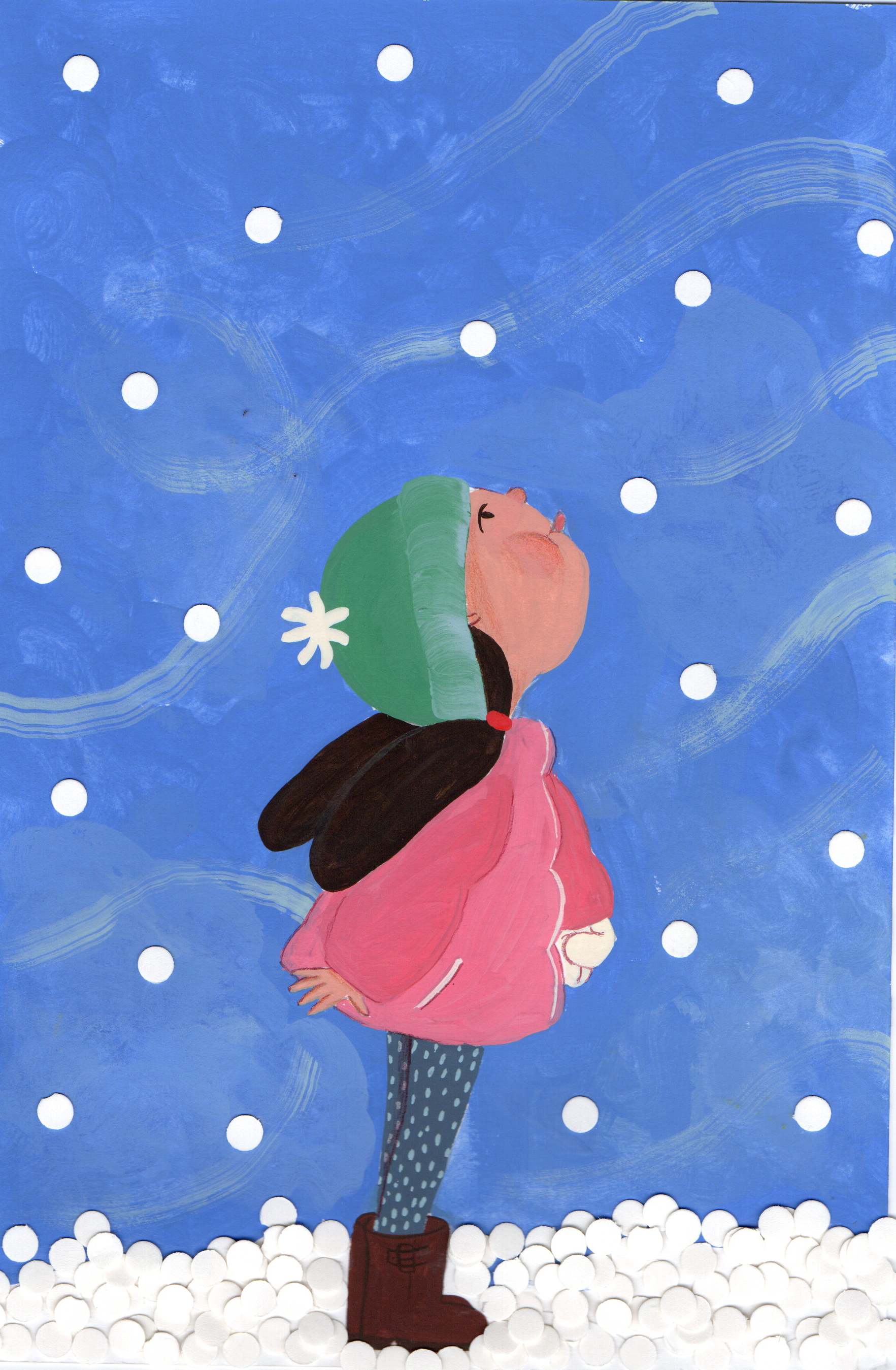 Child in winter coat watching snow fall